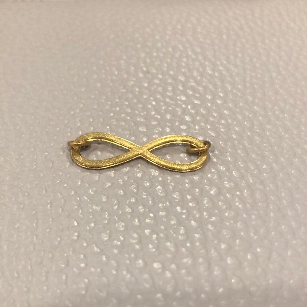 Gold infinity charm